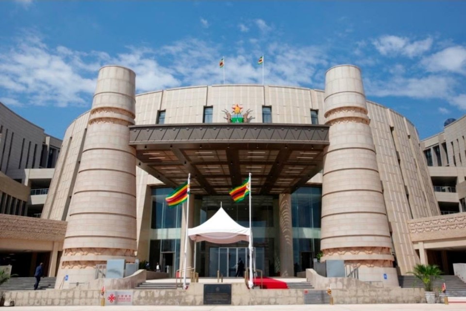 Institutional building with Zimbabwe flags